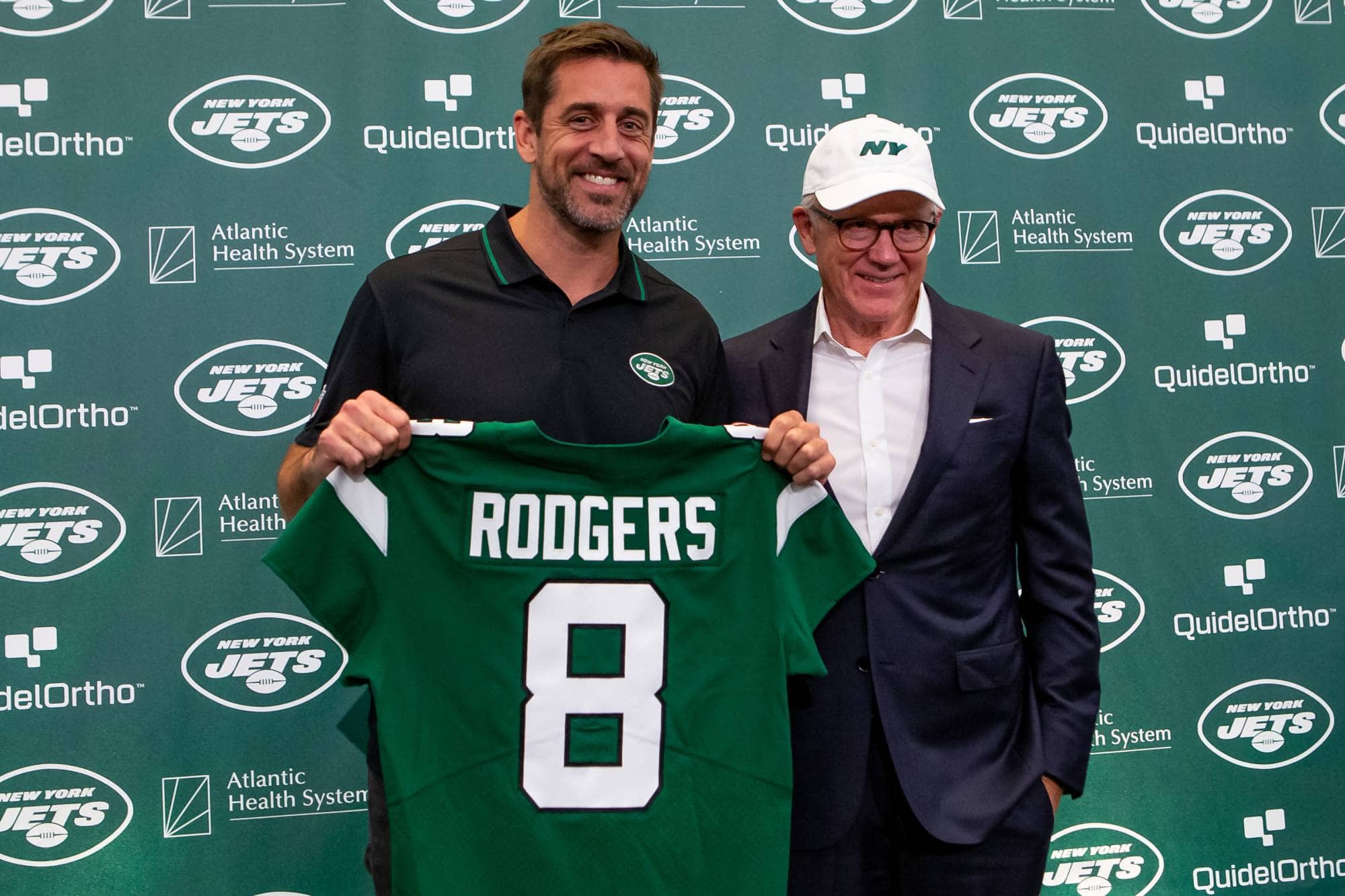  Apr 26, 2023; Florham Park, NJ, USA; New York Jets quarterback Aaron Rodgers (left) and owner Woody Johnson pose for a photo during the introductory press conference at Atlantic Health Jets Training Center. Mandatory Credit: Tom Horak-USA TODAY Sports