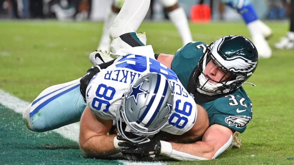 Cowboys TE Luke Schoonmaker is tackled just short of the goal line by Eagles S Reed Blankenship in a game on 11/5/2023
