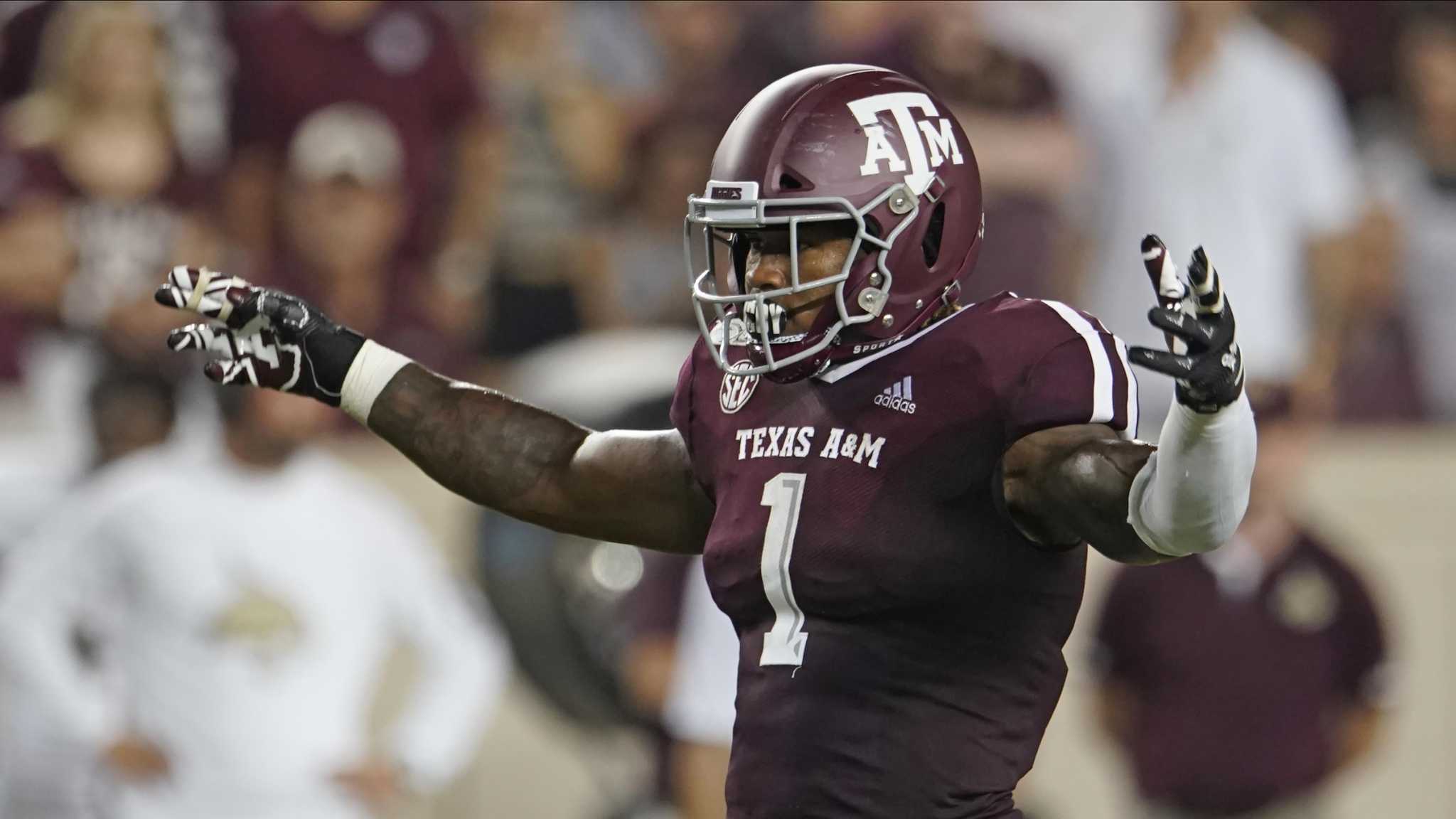 Texas A&M's Buddy Johnson (1) looks against against the Texas State offense during the second half of an NCAA college football game in College Station, Texas, Thursday, Aug. 29, 2019. (AP Photo/Chuck Burton