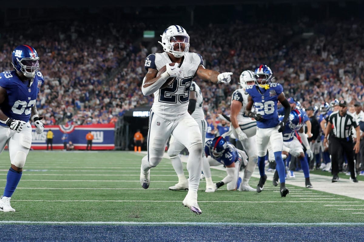 Which Cowboys running back is winning the starting job?