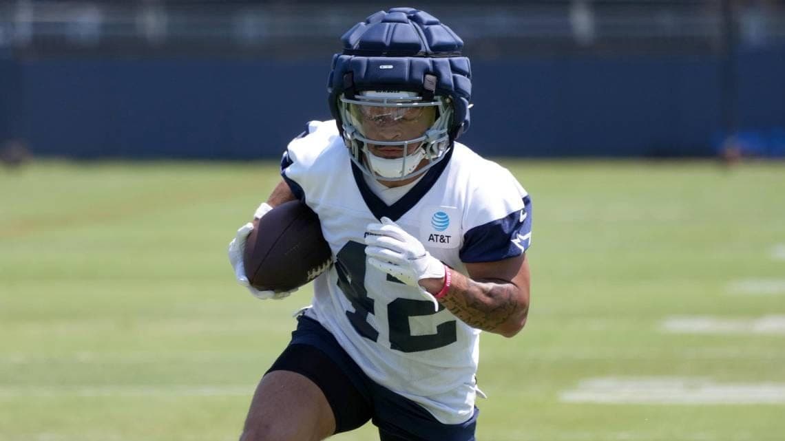 Which Cowboys running back is winning the starting job?