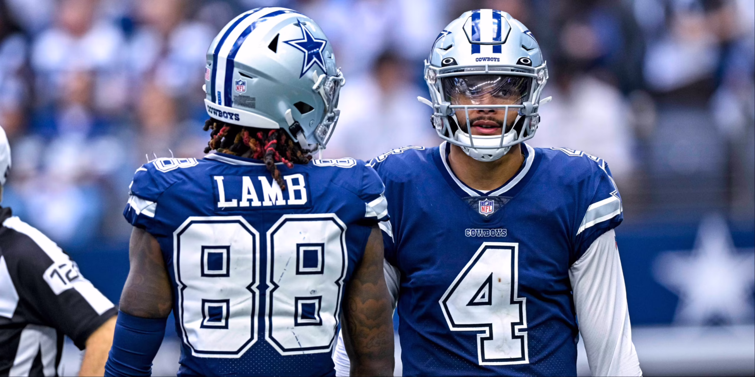 Two football players in blue jerseys and silver helmets Dak Prescott Deal Incoming?