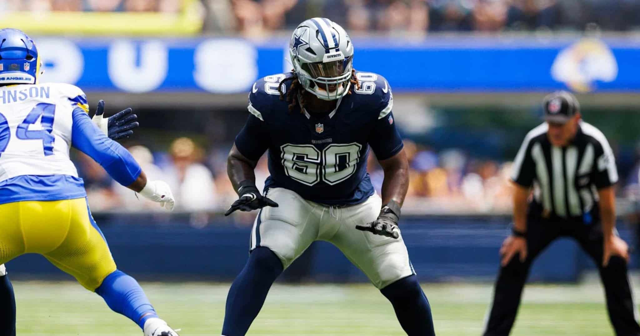 Dallas Cowboys linebacker in action during a game at AT&T Stadium, showcasing team defense and key plays.
