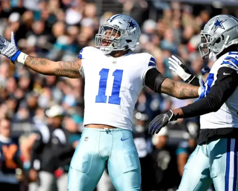 Celebrating Dallas Cowboys football players on the field during an NFL game, highlighting team spirit, athleticism, and game-day excitement.