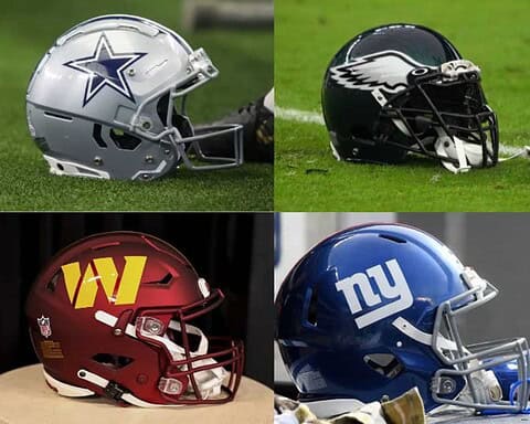 Dallas Cowboys helmet on grass field, focusing on NFL football team gear and safety equipment.