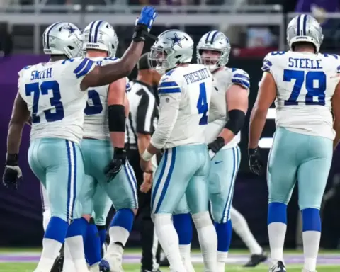 High-energy NFL Dallas Cowboys football players celebrating on the field during a game, showcasing team unity, performance, and American football action.