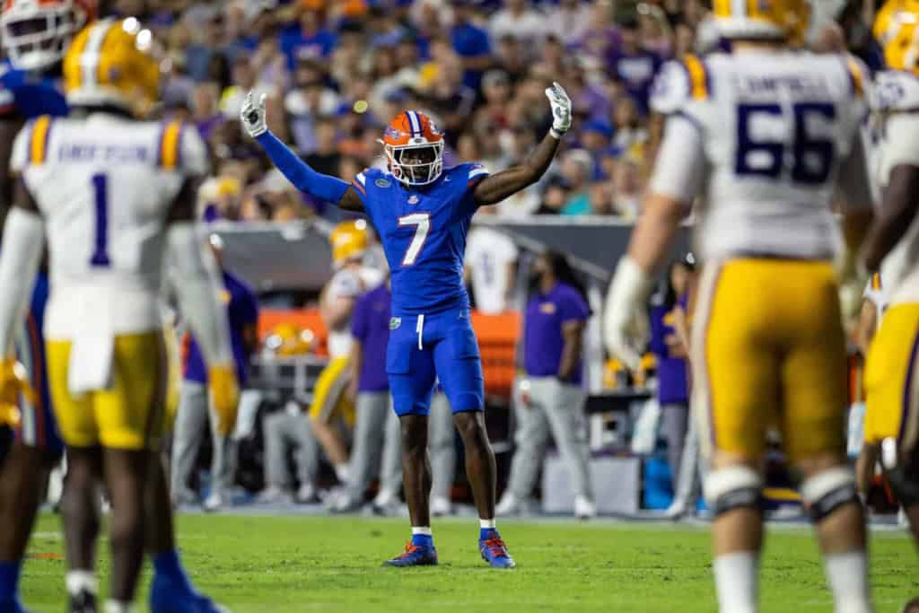 Altar text: Florida Gators football player celebrating during a game.