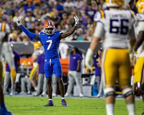 Altar text: Florida Gators football player celebrating during a game.