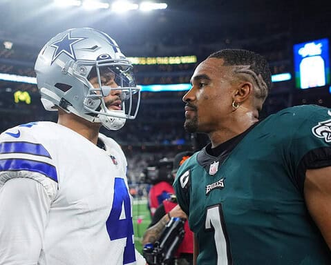 Player conversations during an NFL game between the Dallas Cowboys and Philadelphia Eagles, highlighting team rivalry, game strategy, and athlete interaction. Focus on football players, helmets, uniforms, and stadium environment.
