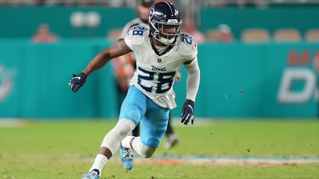 Athlete in the Dallas Cowboys jersey running on the football field during a game, capturing the excitement of NFL football.