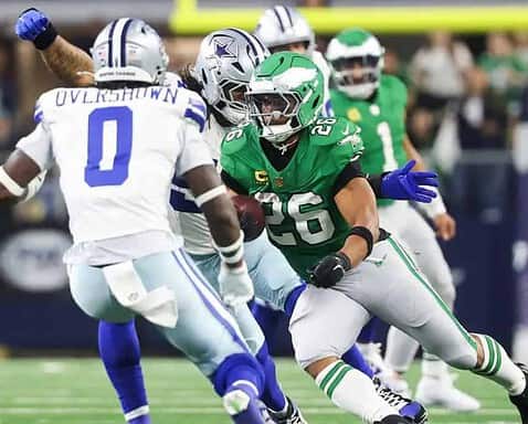 Philadelphia Eagles running back Saquon Barkley is about to be stripped of the football.