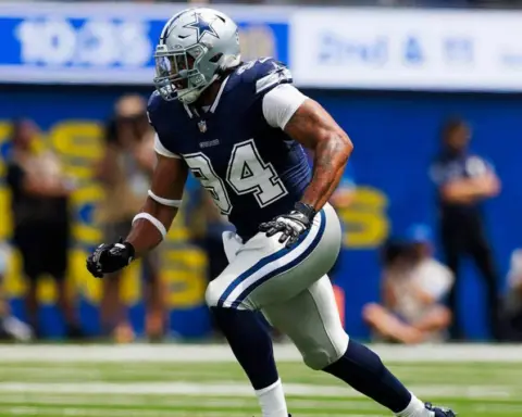 Fast-paced football player from the Dallas Cowboys during a game, showcasing athleticism and team spirit on the field, with a focus on team uniform, helmet, and action shot.